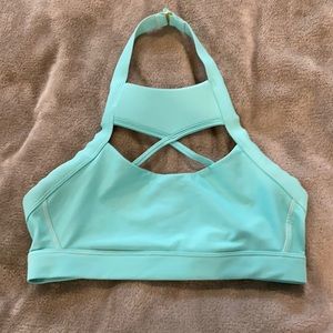 Chestee teal sports bra. Never worn. Size 8/medium.